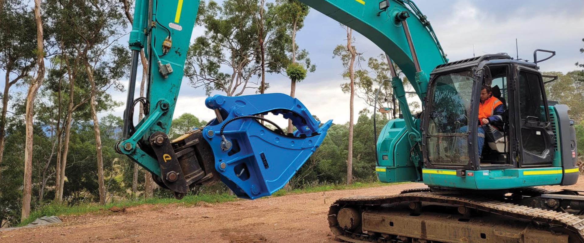 kobelco excavator with hydraulic grabs