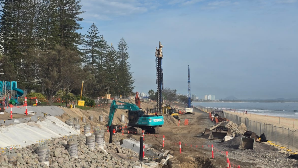 excavator on beach